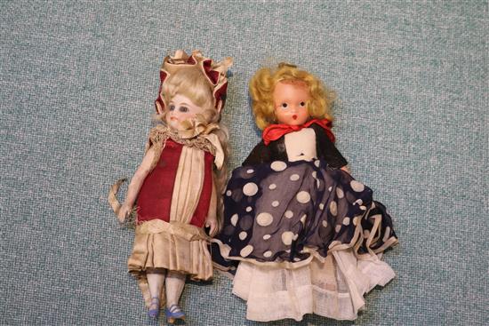 Two late 19th century bisque dolls and other small dolls
